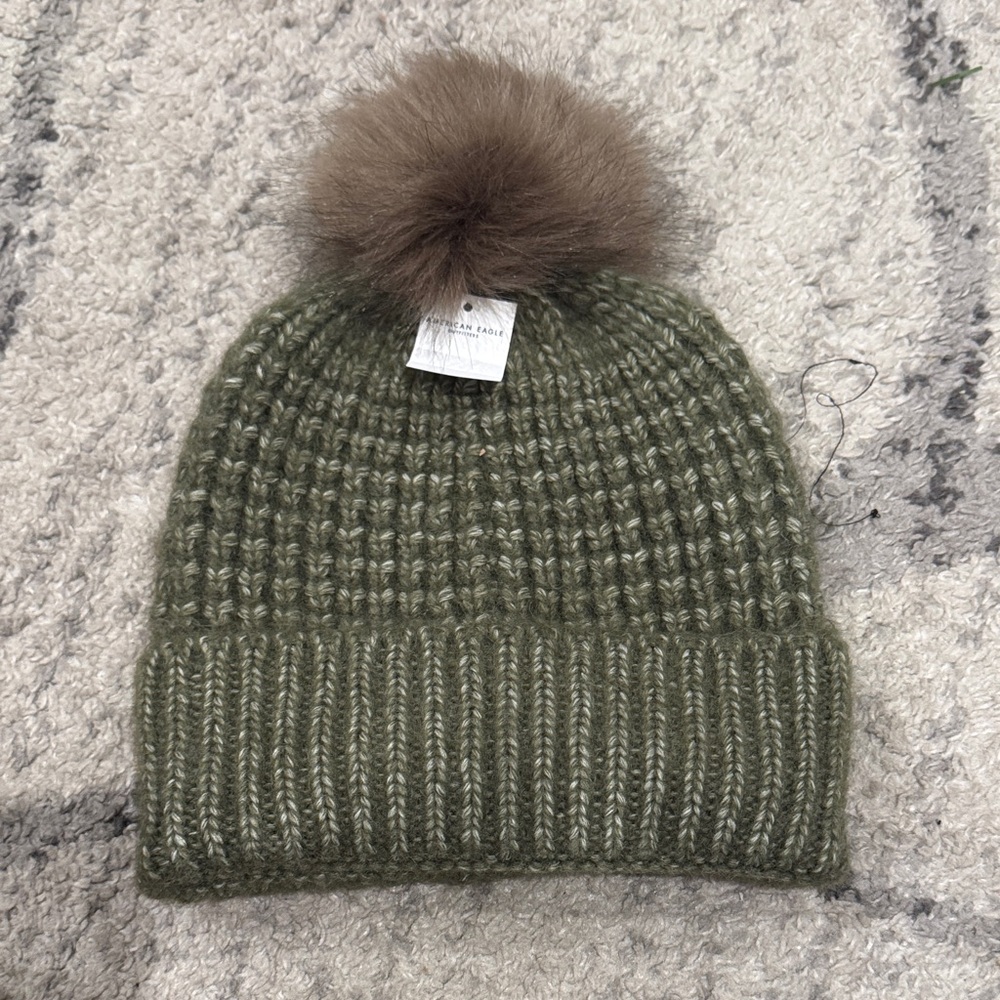Green Knit Beanie with Brown Pom Pom - American Eagle